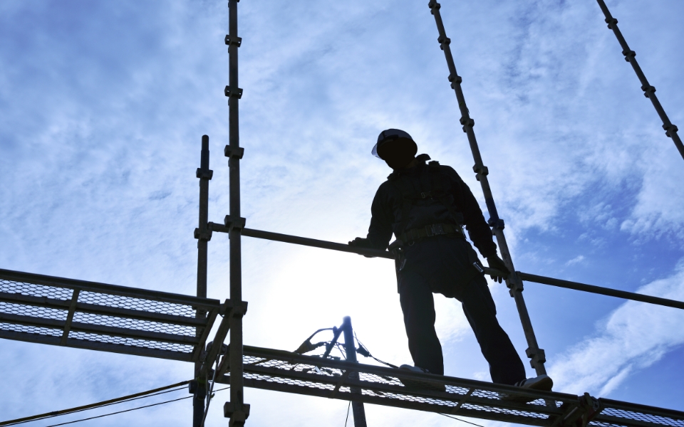 Construction worker on scaffolding